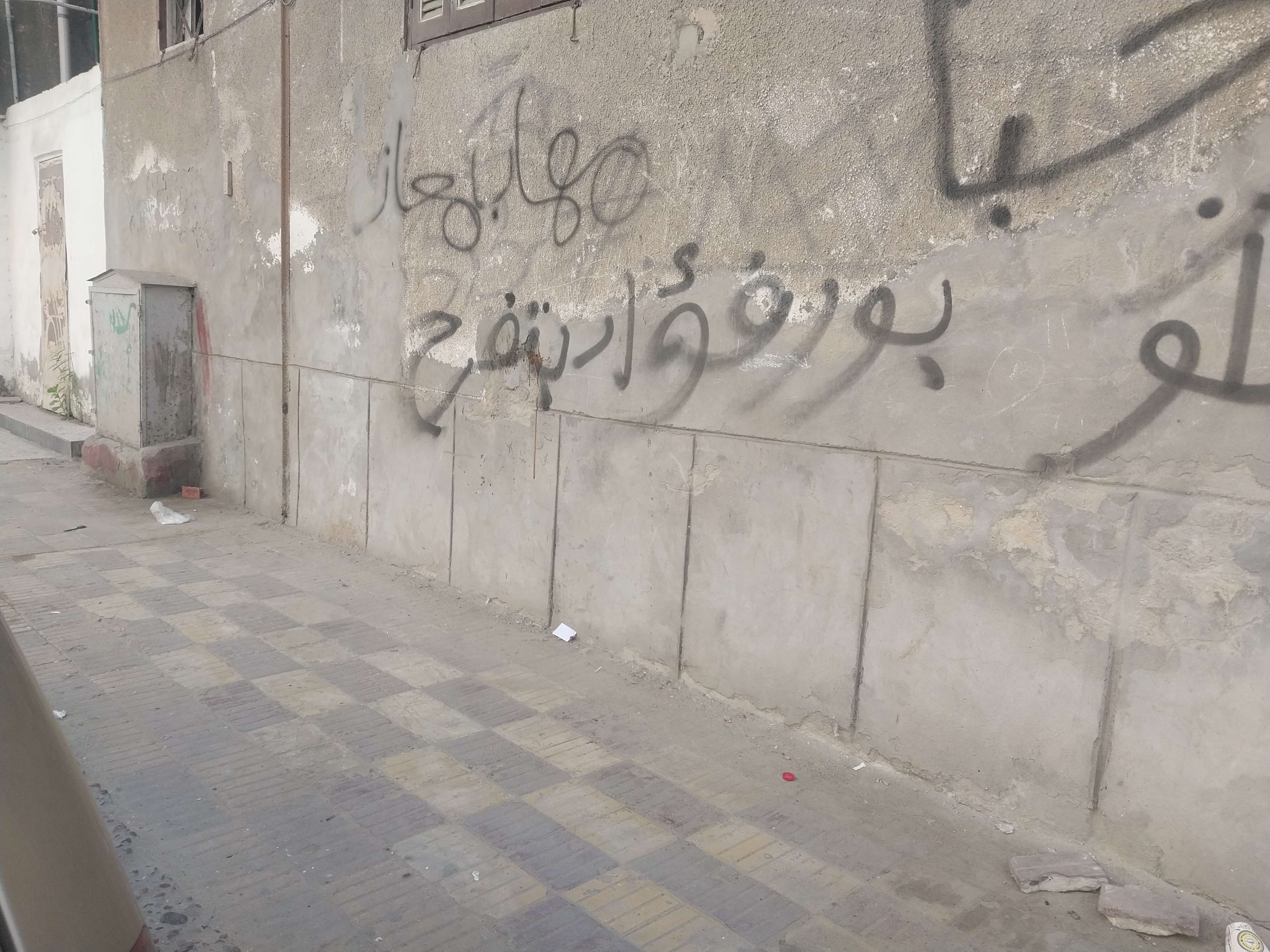 The rust crab logo drawn with chalk on my black board